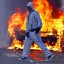 Anarchy broke out in UK last night as hooded youths set fire to cars, bins and buildings as police battled to bring them under control
