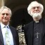 All smiles: Scholar Richard Dawkins, left, with the Archbishop of Canterbury Rowan Williams, right, ahead of their debate at Oxford University