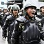 Chinese paramilitary police patrol in Urumqi, western China’s Xinjiang province. (AP Photo/Eugene Hoshiko)