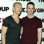 Dan Savage, on right in mauve shirt, pictured with his "male friend"