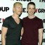 Dan Savage, on right in mauve shirt, pictured with his "male friend"