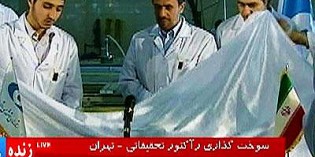 Defiant Ahmadinejad Loads Iranian-made Fuel Rods Into Nuclear Reactor Defiant Ahmadinejad Loads Iranian-made Fuel Rods Into Nuclear Reactor