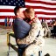 Welcome home: Sgt Brandon Morgan's embrace with boyfriend Dalan Wells has gone viral in the blogosphere after it was posted on Facebook.