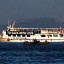 The activist run boat "Audacity of Hope" is escorted by the Greek coast guard in port of Perama, near Athens, Greece, July 1, 2011.