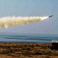 In this undated file photo, a Ghader missile is launched at the shore of sea of Oman during Iran's navy drill. A missile under construction at an Iranian research-and-development facility, which was damaged by a mysterious explosion in November, was a long-range missile prototype with a range of 6,000 miles. Hamed Jafarnejad/Fars News Agency/AP/File