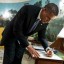 obama-writing-letter-wh-photo-benghazi-murder-victim-tyrone-woods-father