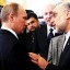 Russian Prime Minister Vladimir Putin (L) speak to Iran's Foreign Minister Ali Akbar Salehi during a meeting of the Shanghai Cooperation Organisation in St. Petersburg November 7, 2011. Credit: Reuters/Alexsey Druginyn/RIA Novosti/Pool