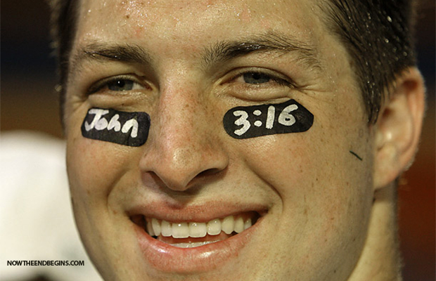 tim-tebow-wearing-john-316-under-his-eyes-on-football-field