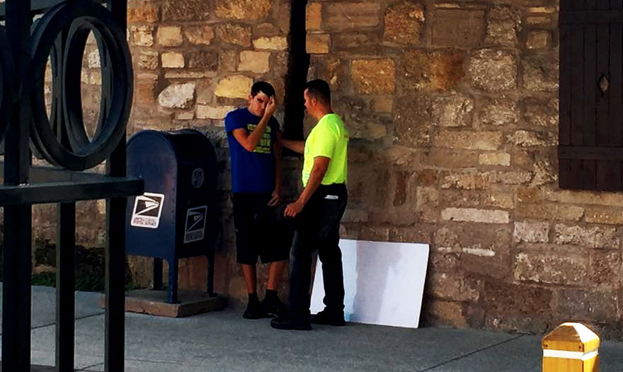 young-man-getting-saved-through-street-preaching-nteb-gospel-tracts-witnessing