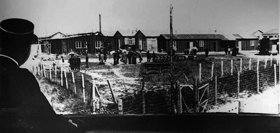 policeman-guards-french-concentration-camp-of-pithiviers-near-orleans-1941-france-nazi-germany