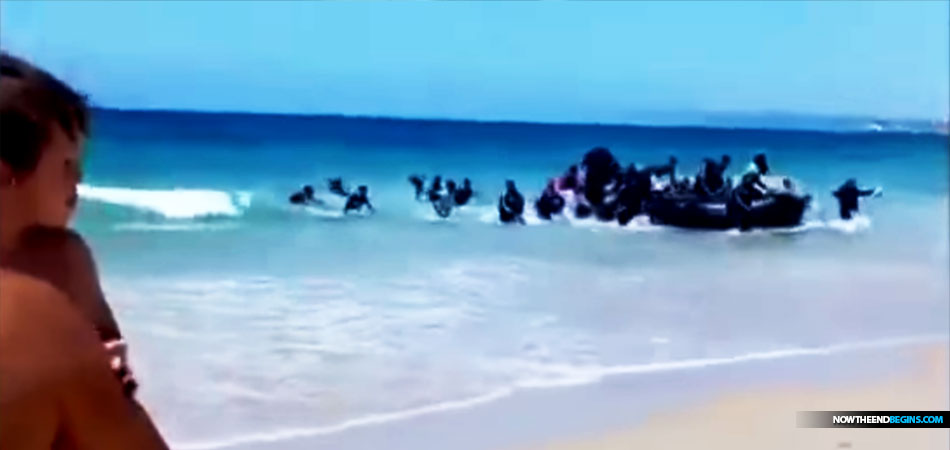 boatload-muslim-migrants-land-beach-spain-illegals-nteb
