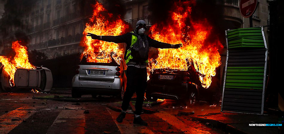 france-paris-burning-yellow-jacket-vest-gas-price-revolt-macron