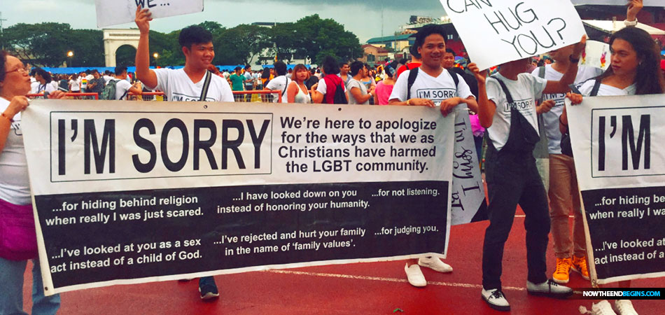 Christians surprise Pride parade marchers with signs apologizing for anti-LGBTQ views