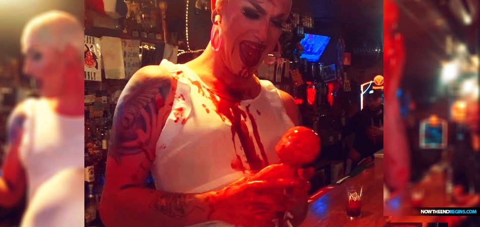 Video out of New York shows a drag queen simulating cutting a baby out of her womb, drinking blood and pulling its head off as onlookers in a bar cheer.