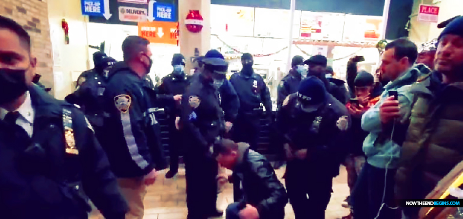 Five maskless, unvaccinated protesters wound up in handcuffs Monday night after attempting to order food at a Downtown Brooklyn Burger King, apparently in opposition to the city’s COVID protocol. The arrest of the unvaccinated has begun in New York City, and it will only increase across the country in the coming days and weeks. Everywhere you have mask and vaccine mandates, you can expect to see the unmasked and the unvaccinated arrested and brought to criminal, not civil, court. America is firmly in the hands of wicked rulers whose power will only increase and become more intrusive and destructive. “When the righteous are in authority, the people rejoice: but when the wicked beareth rule, the people mourn.” Proverbs 29:2 (KJB) On January 10th on the Prophecy News Podcast, we will celebrate Day 666 of 15 Days To Flatten The Curve, which just coincidentally is the very day when Biden vaccine mandate penalties are set to start terrorizing employers. 2022 will be the roughest year on so far, unless of course, you are willing to lay down before the government, and receive their sacrament of vaccination  injection a minimum of 3 times. What is happening right now is not politics and it’s not science, it is religion, and if you don’t convert you will be burned at the stake. Sound familiar? The Bible has warned you for 2,000 years about the coming One World Religion, and you are watching to all come together in front of your face.