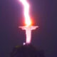 Incredible moment a huge bolt of lightning strikes 125ft Christ the Redeemer statue in Brazil 