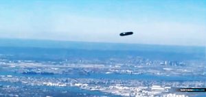 woman-sees-ufo-outside-her-palne-window-flying-over-new-york-city