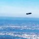 woman-sees-ufo-outside-her-palne-window-flying-over-new-york-city