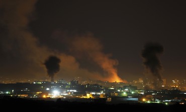 Smoke rises after Israeli air strikes in the northern Gaza Strip